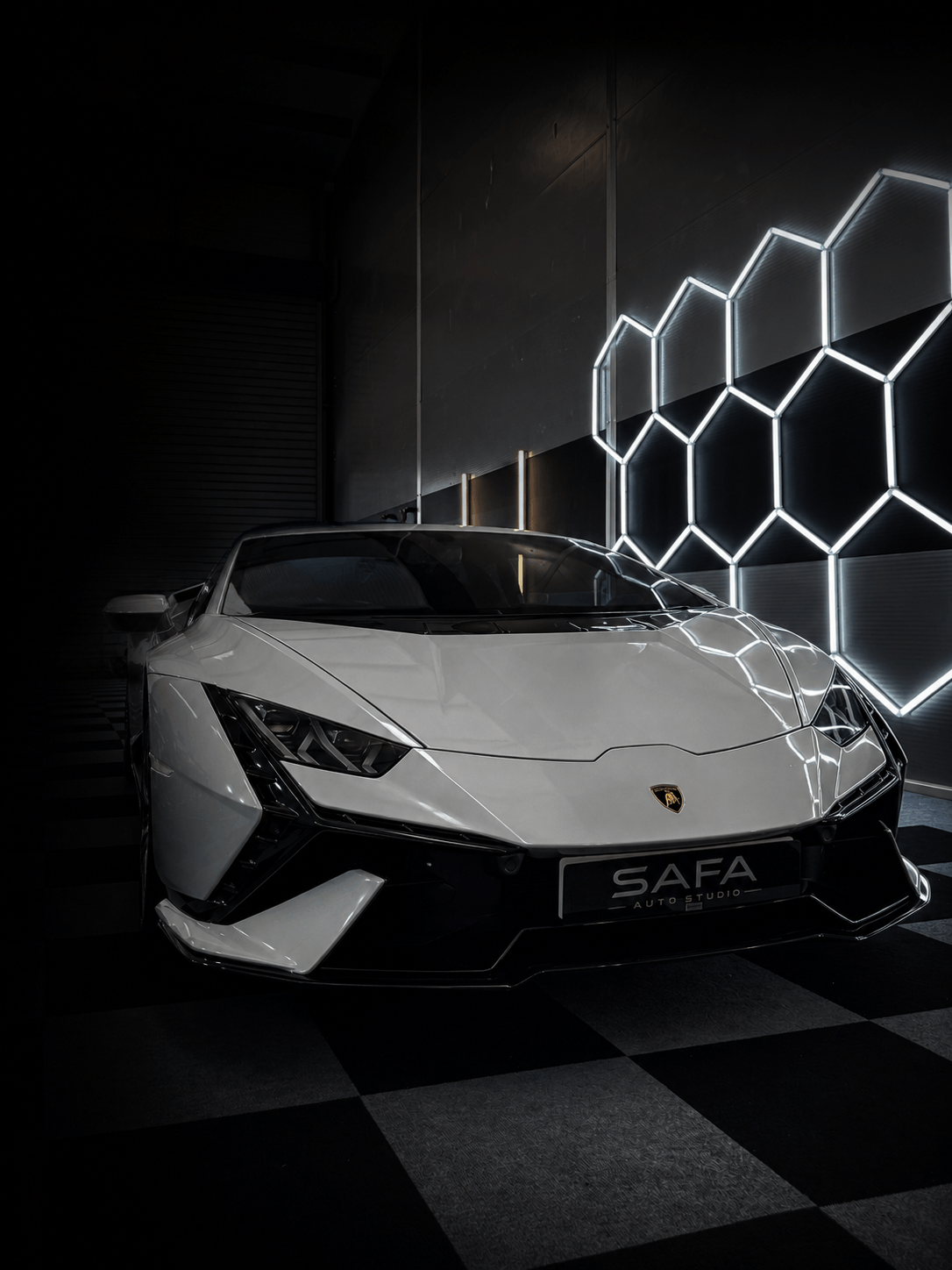 Premium vehicle outside SAFA Auto Studio in Newport.