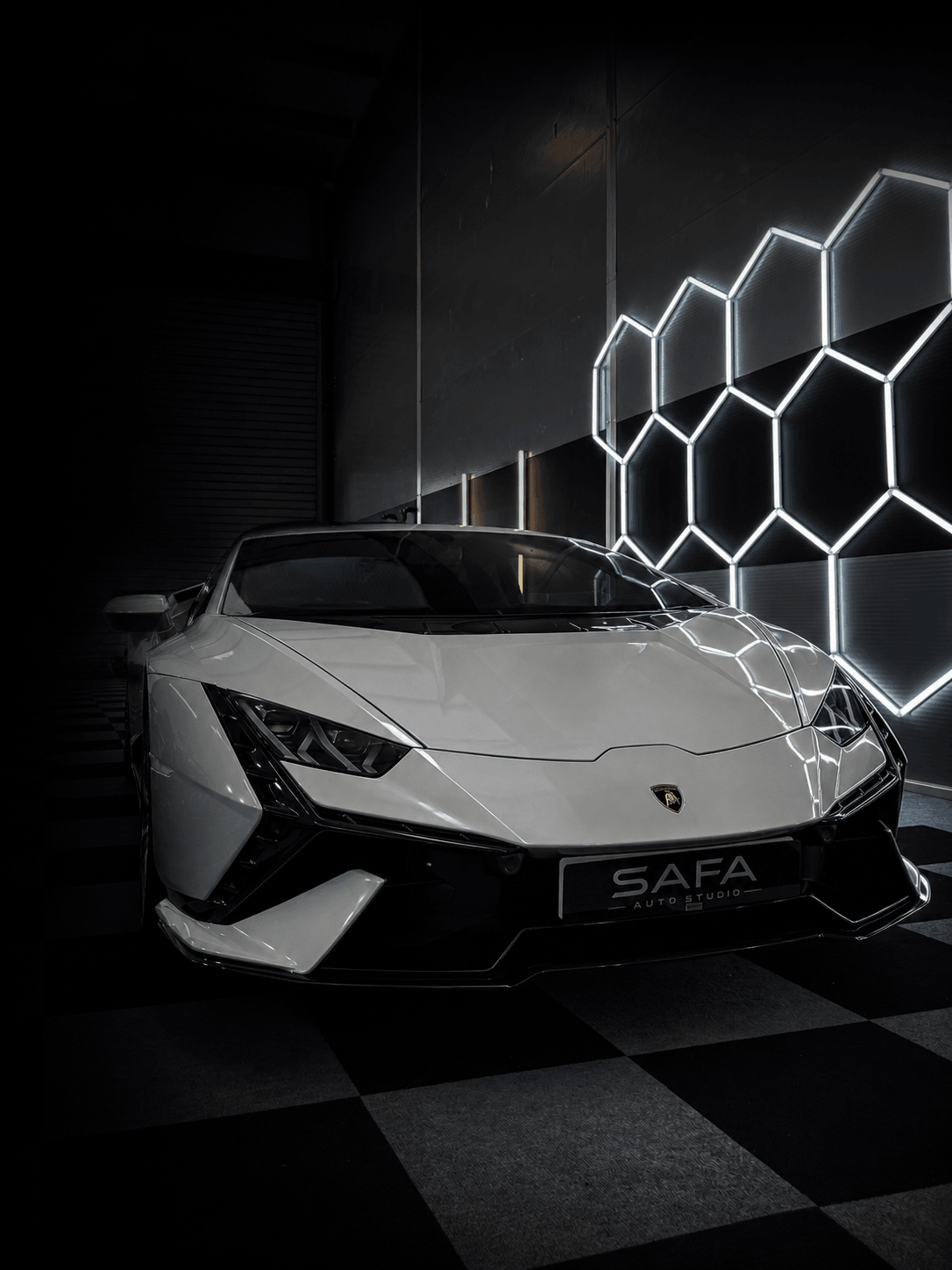 Black Lamborghini with SAFA plate outside the detailing studio in Newport.